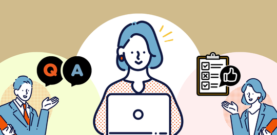 学習している女性をサポートするスタッフ